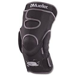 The knee brace is black in color and features triaxial hinges, upper and lower strapping, and adjustable fit
