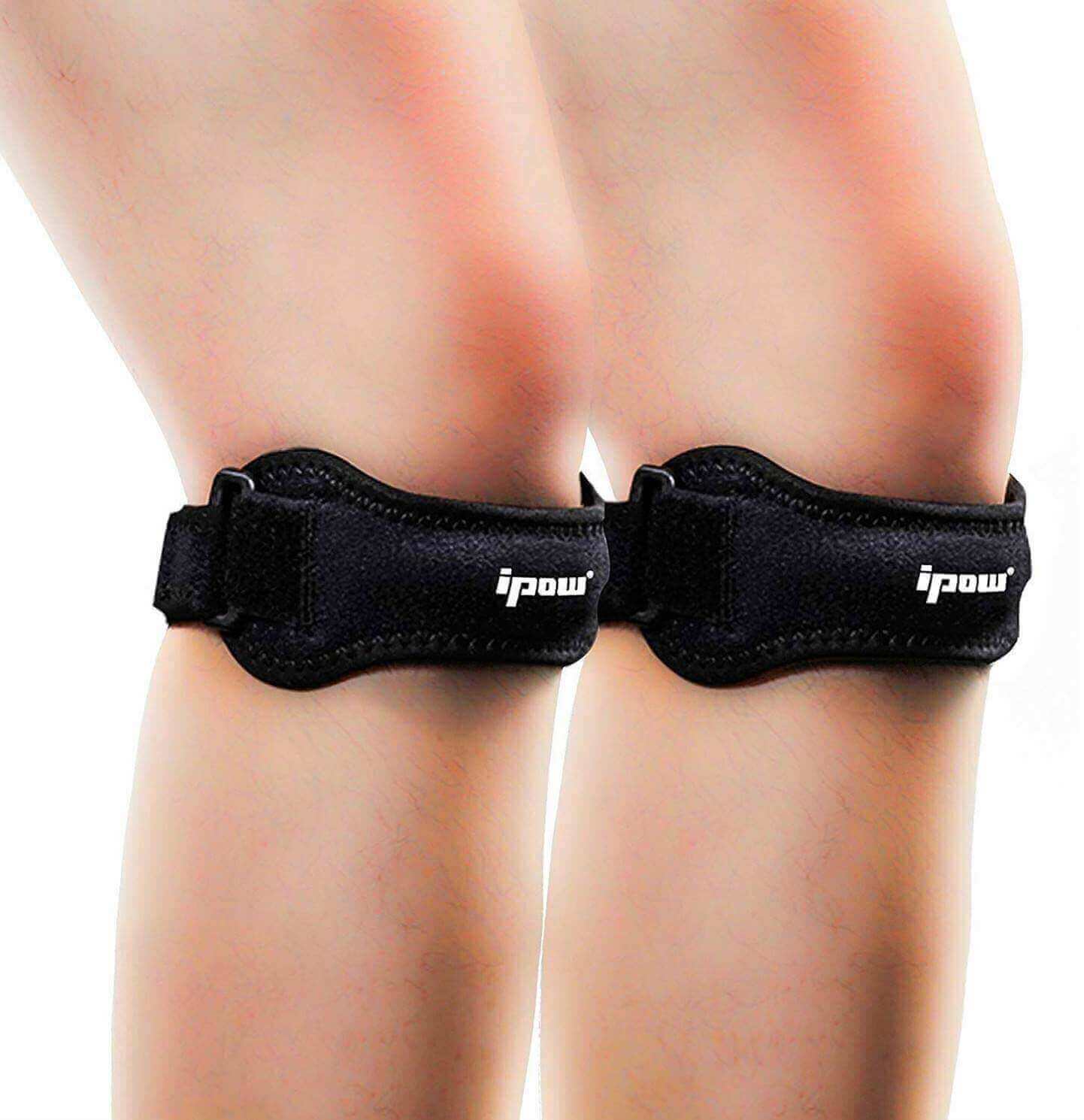 A black knee brace for volleyball with adjustable straps and a cushioned pad for extra support and protection during intense matches