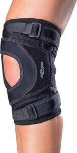 athlete wearing a DonJoy knee brace while engaging in sports activities, highlighting its protective and supportive features for active individuals