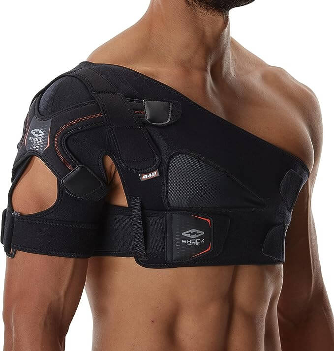 man with dislocated shoulder wearing shoulder brace for recovery