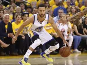 basketball star Steph Curry with ankle brace during game