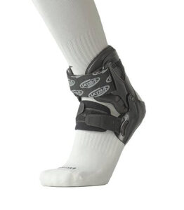 Ultra Zoom Ankle Brace fitting seamlessly into athletic shoes, ensuring support without compromising style